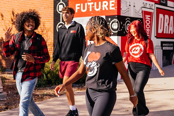 Four students on a campus tour