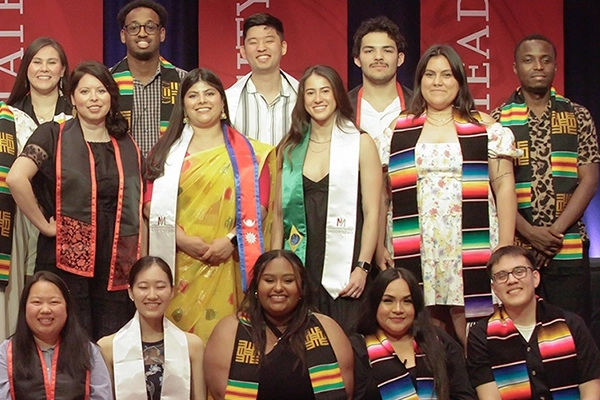 Group of international students with their sashes