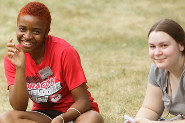 Students sitting on lawn