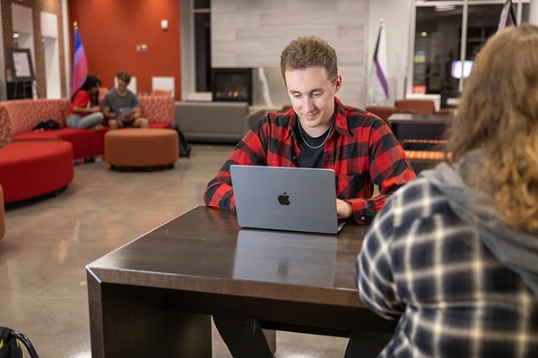 Students studying on laptops